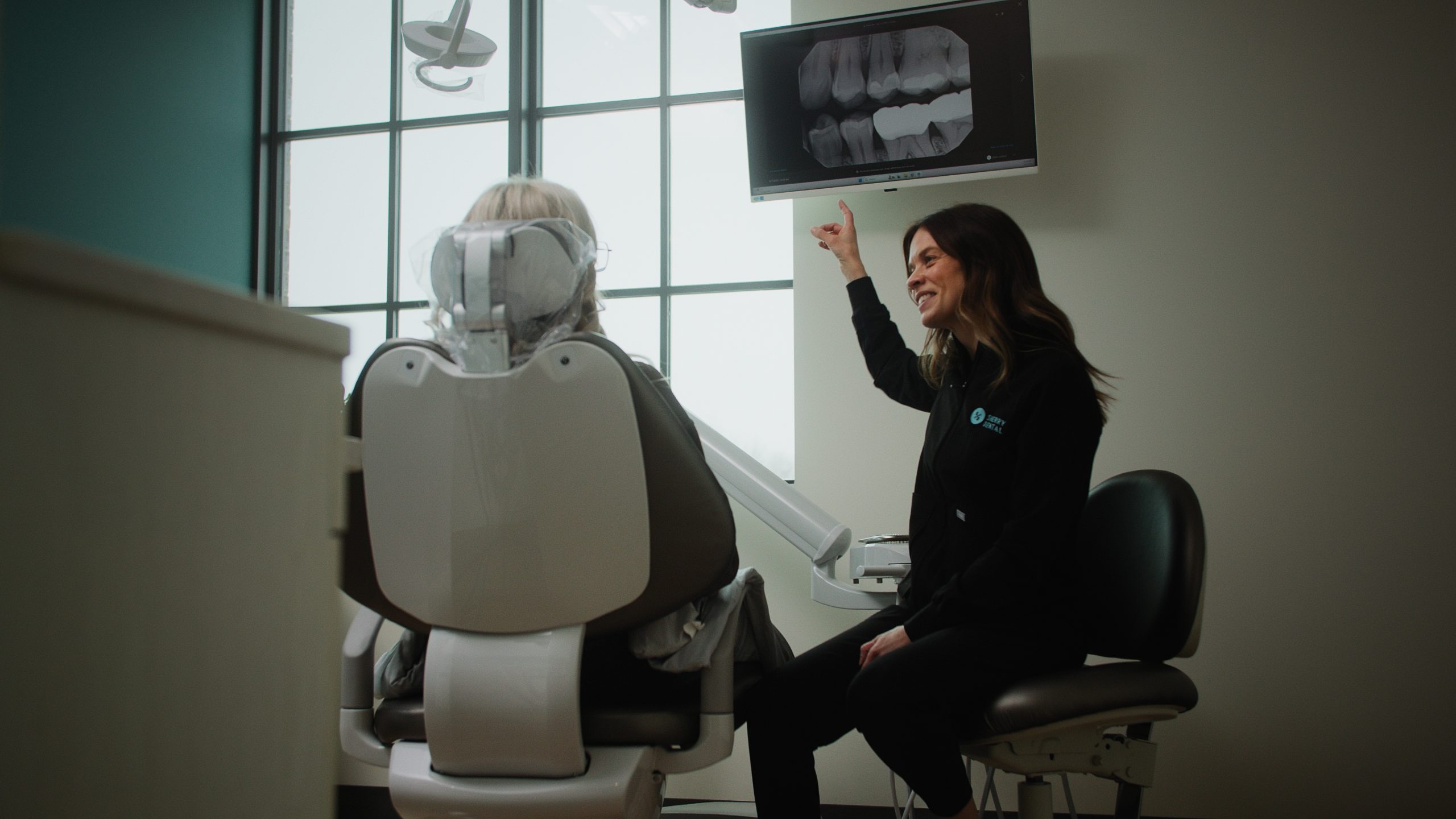 A patient receiving restorative dental care at Sherry Dental in Grand Rapids, MI